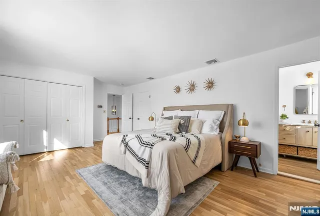 a bed room with a bed and a couch