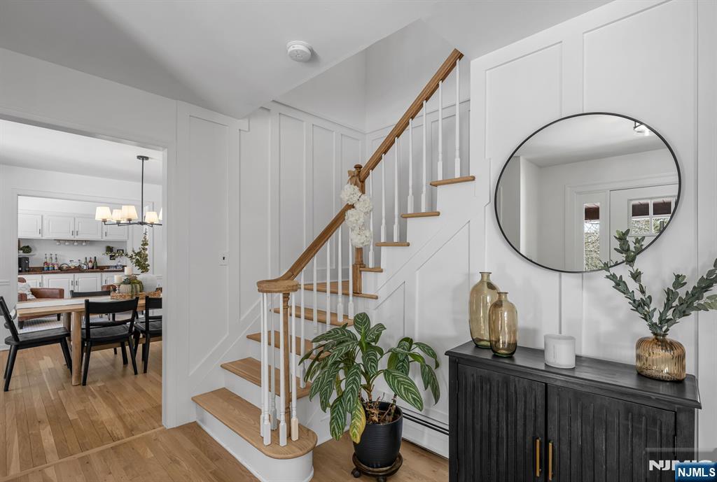 15 Cobbler Lane Mahwah, NJ 07430 - Photo 4 of 50 a living room with furniture a potted plant and a table