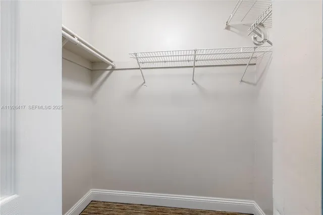 a view of a room with racks on the wall