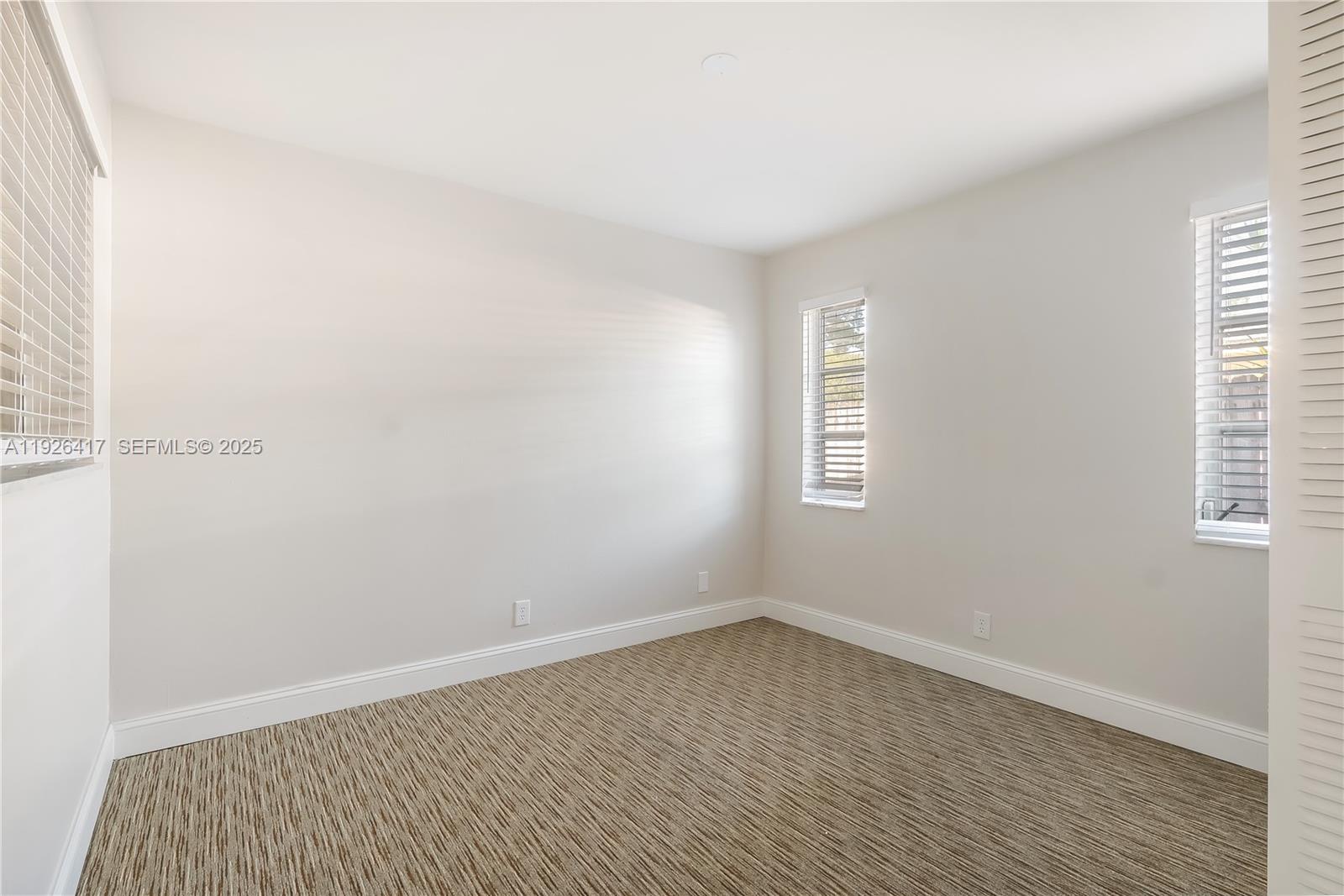 8172 Northwest 67th Avenue Tamarac, FL 33321 - Photo 27 of 44 an empty room with a window