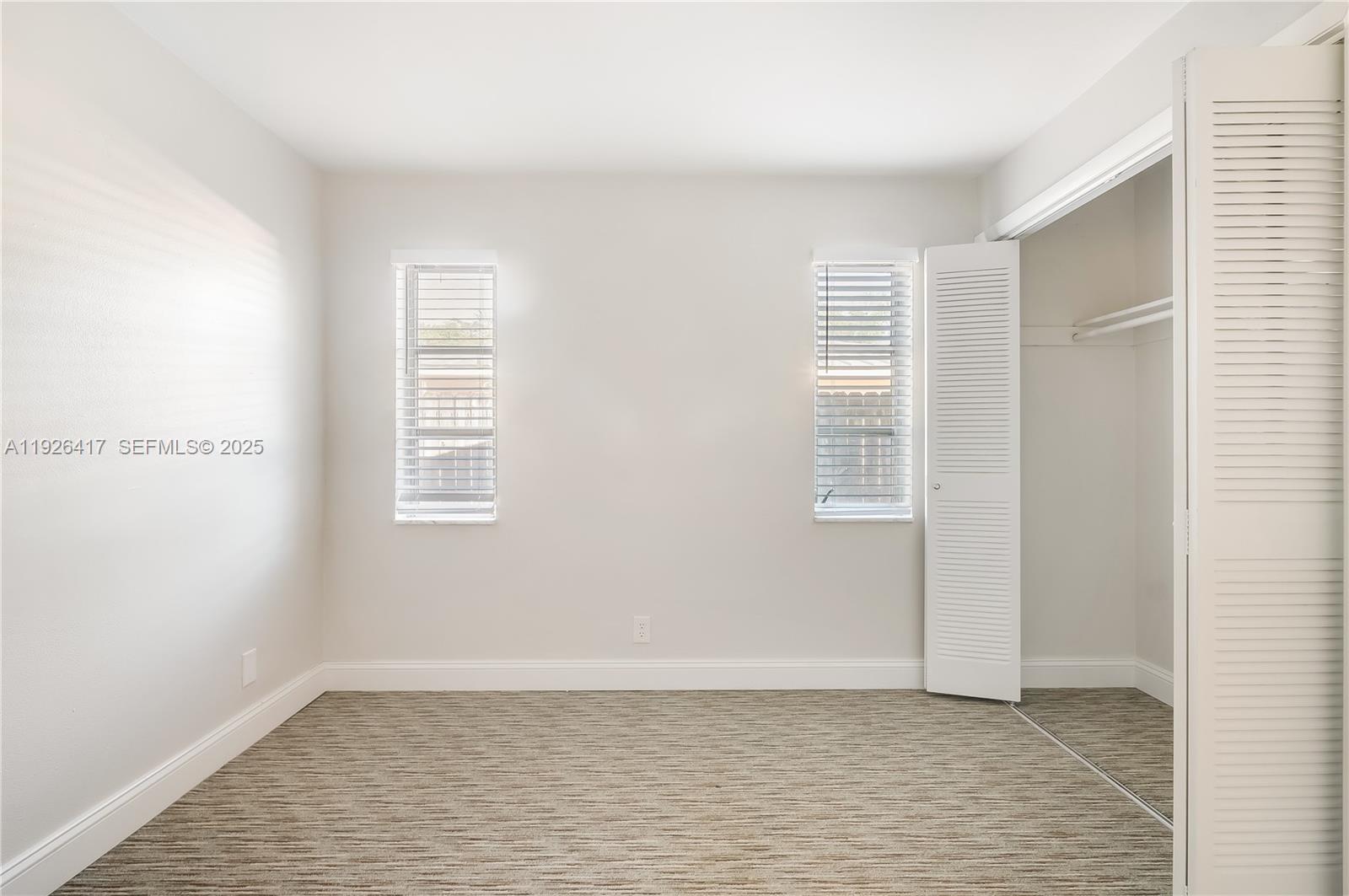 8172 Northwest 67th Avenue Tamarac, FL 33321 - Photo 28 of 44 a view of an empty room with a window