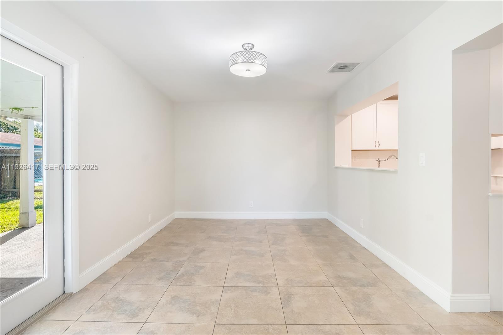 8172 Northwest 67th Avenue Tamarac, FL 33321 - Photo 8 of 44 an empty room with a bathroom and a window