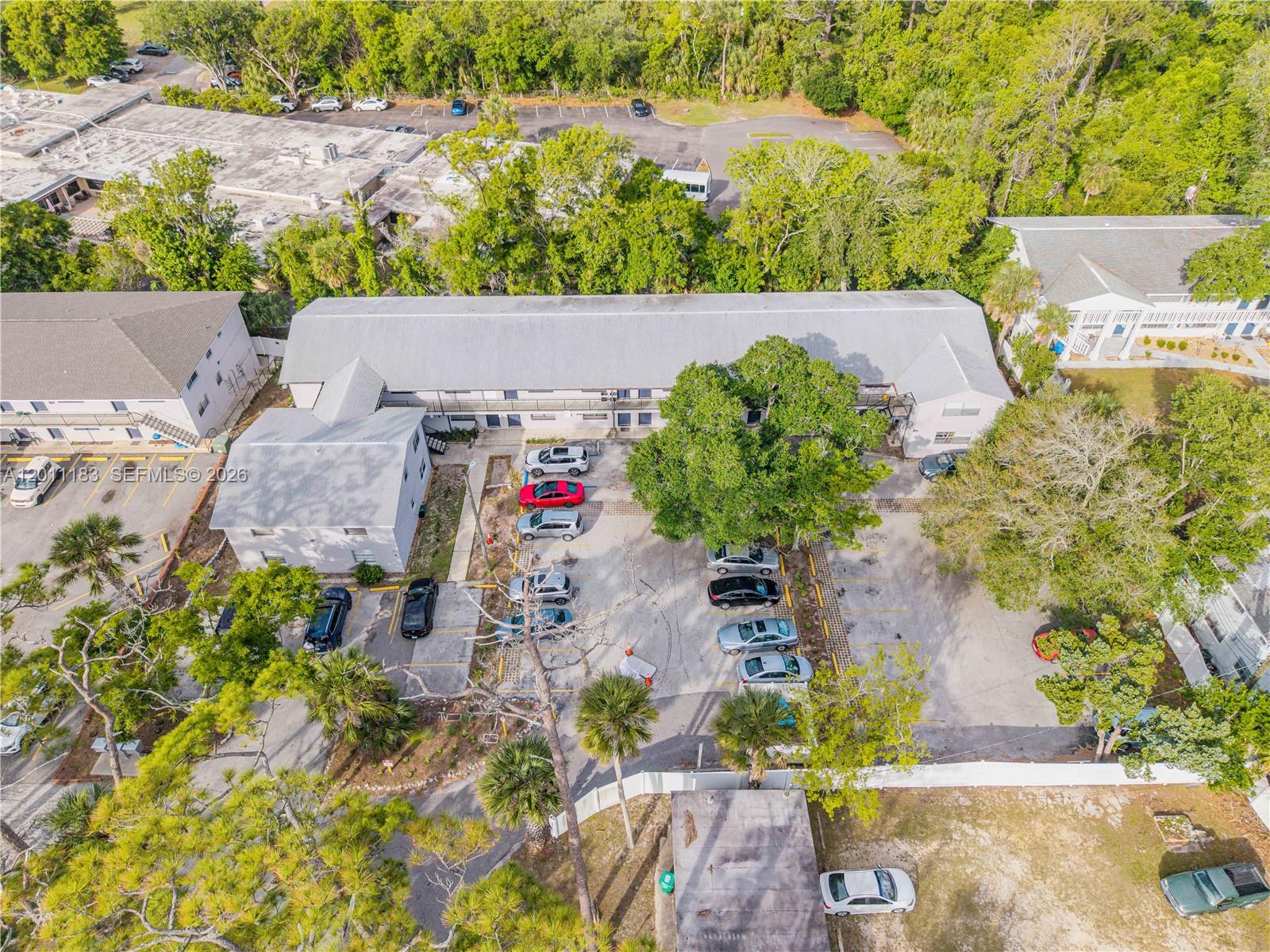 1208 South Ridgewood Avenue Daytona Beach, FL 32114 - Photo 16 of 27 an aerial view of a house with a yard