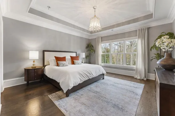 a kitchen with stainless steel appliances granite countertop a refrigerator and a stove