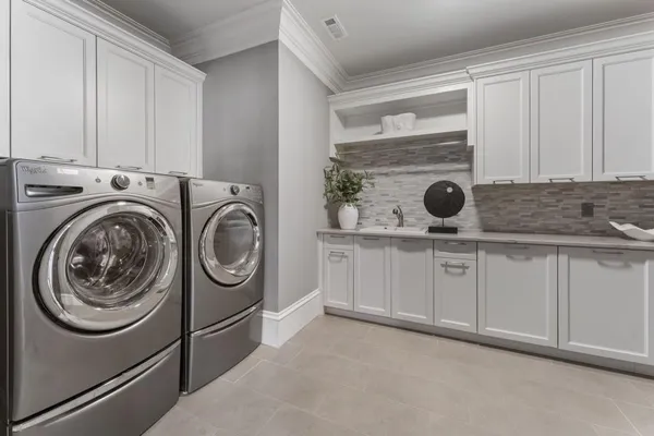 a view of a dining room with furniture large window and wooden floor