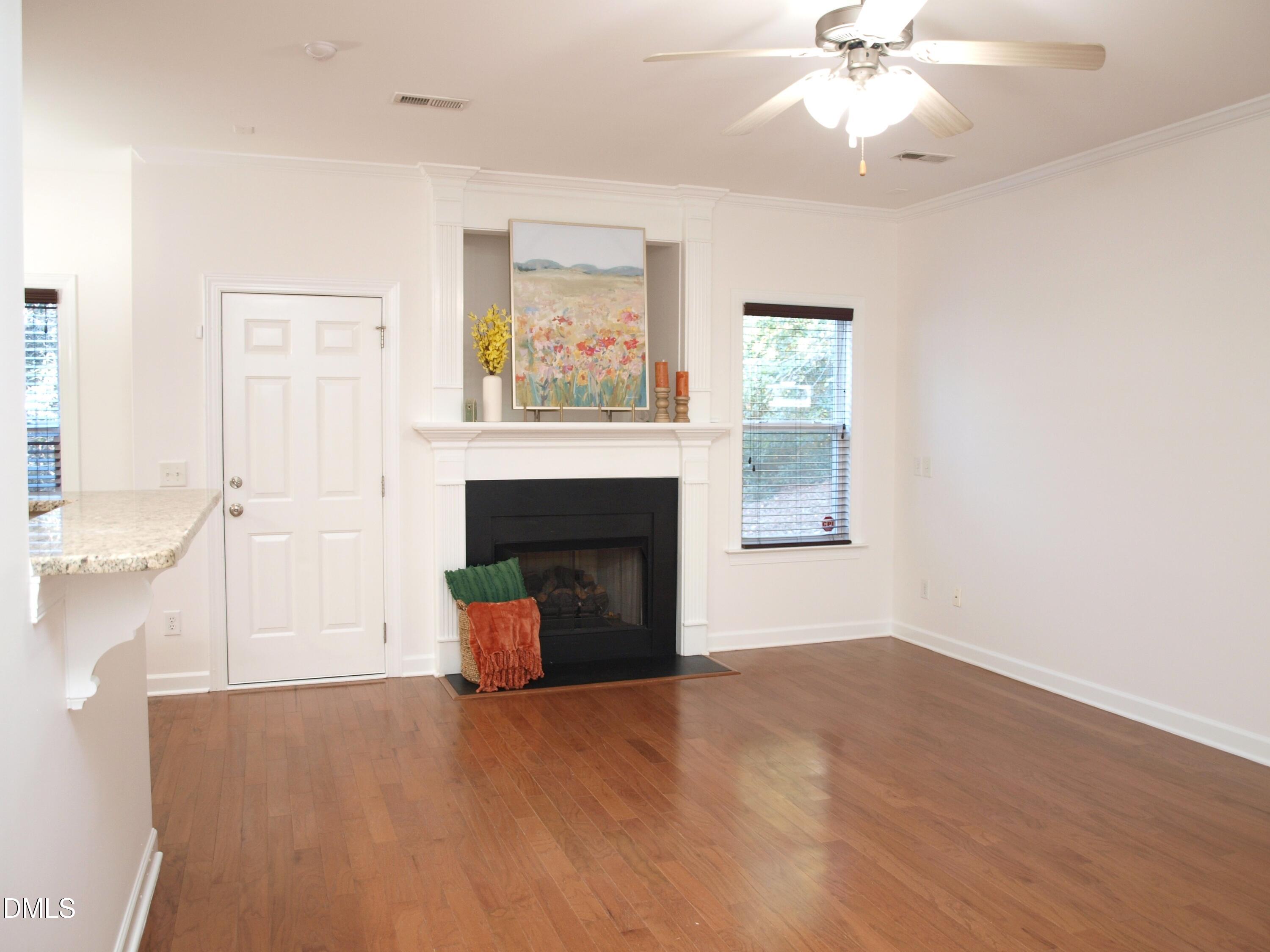 4815 Landover Charge Lane Raleigh, NC 27616 - Photo 3 of 18 a view of empty room with a fireplace
