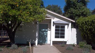 71 Valley Road Oak View, CA 93022 - Photo 1 of 10 a front view of a house with a yard and garage