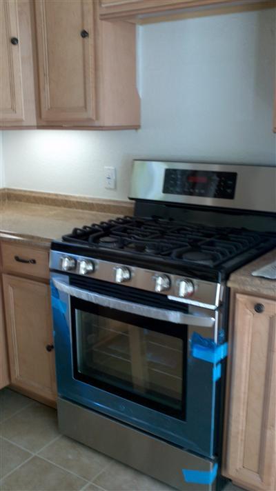 71 Valley Road Oak View, CA 93022 - Photo 5 of 10 a stove top oven sitting inside of a kitchen