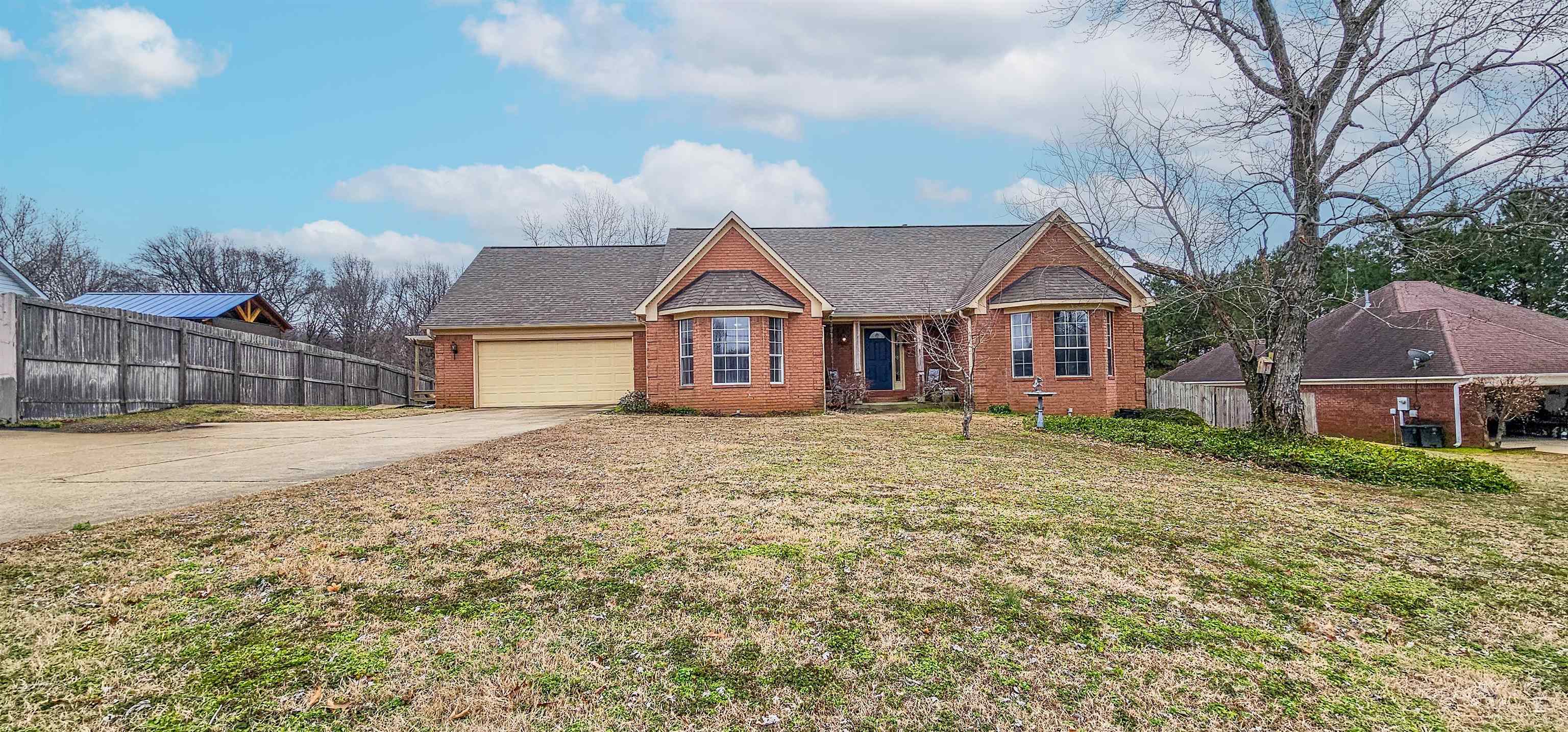 380 Bethel Road Atoka, TN 38004 - Photo 7 of 36 View of front facade with a garage and a front yard