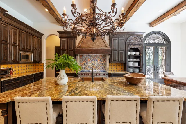 a bathroom with a toilet a sink and a mirror
