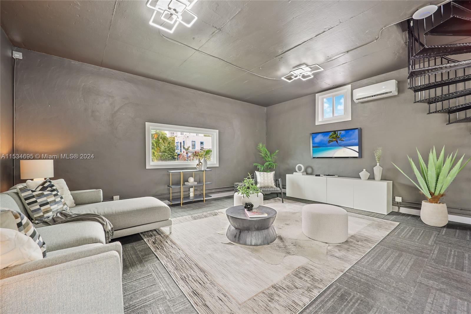 805 Northwest 7th Street Miami, FL 33136 - Photo 18 of 29 a living room with furniture and a potted plant