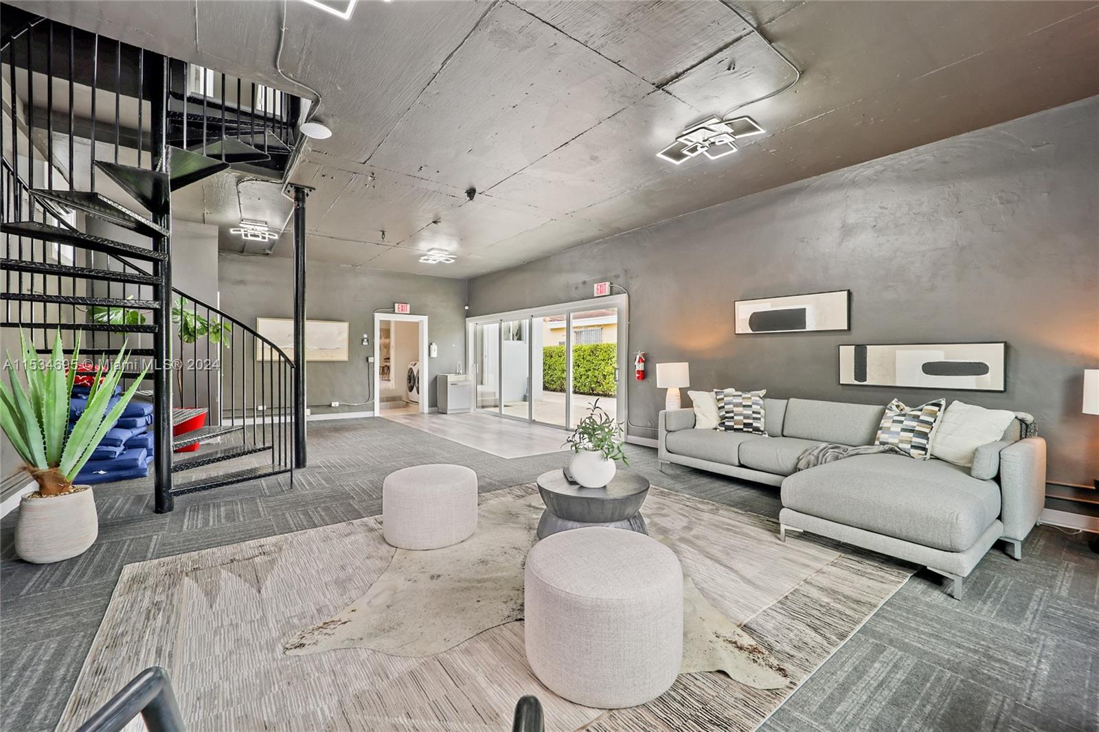 805 Northwest 7th Street Miami, FL 33136 - Photo 21 of 29 a living room with furniture flowerpot and wooden floor