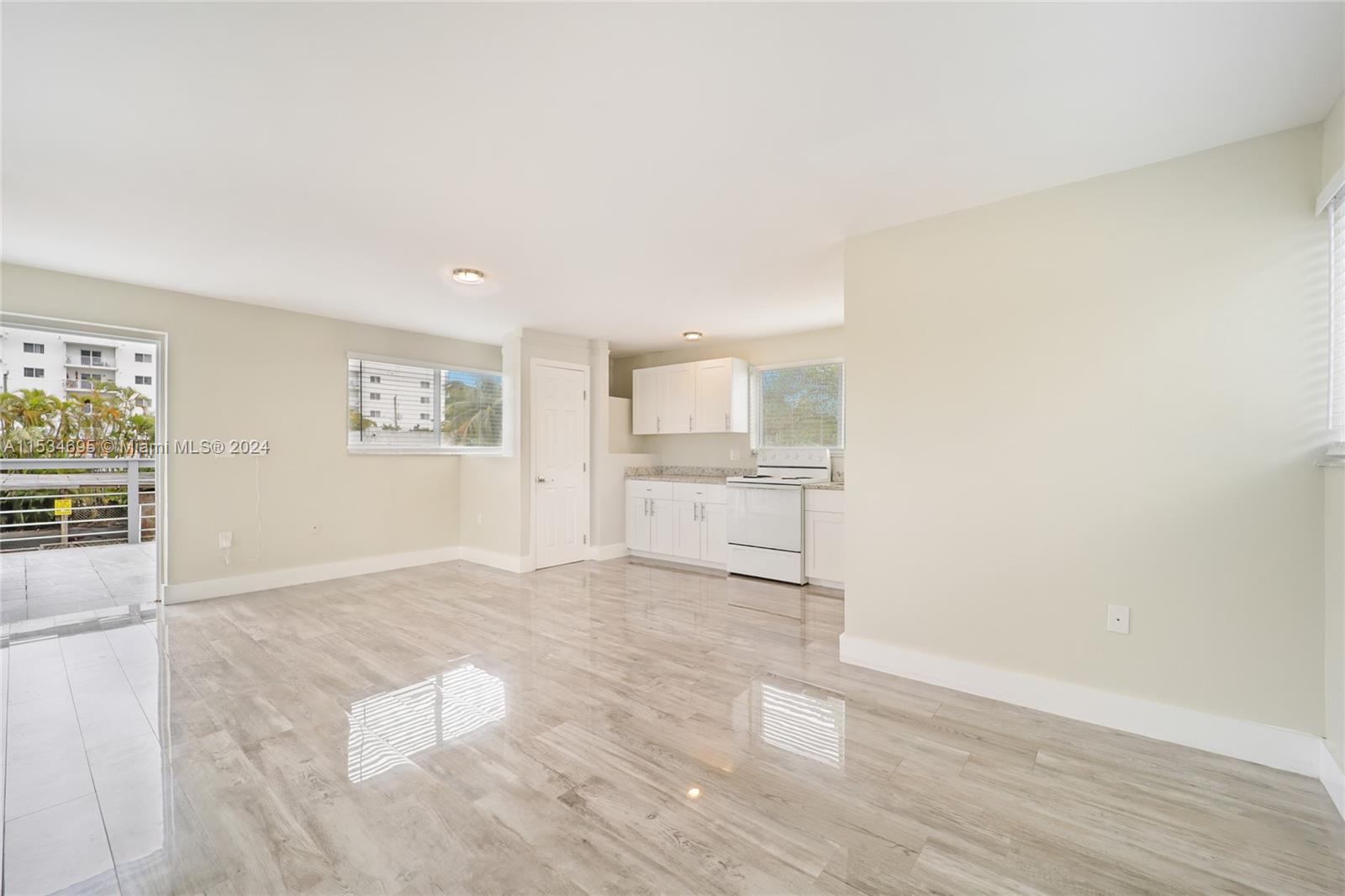 805 Northwest 7th Street Miami, FL 33136 - Photo 22 of 29 a view of an empty room with a window