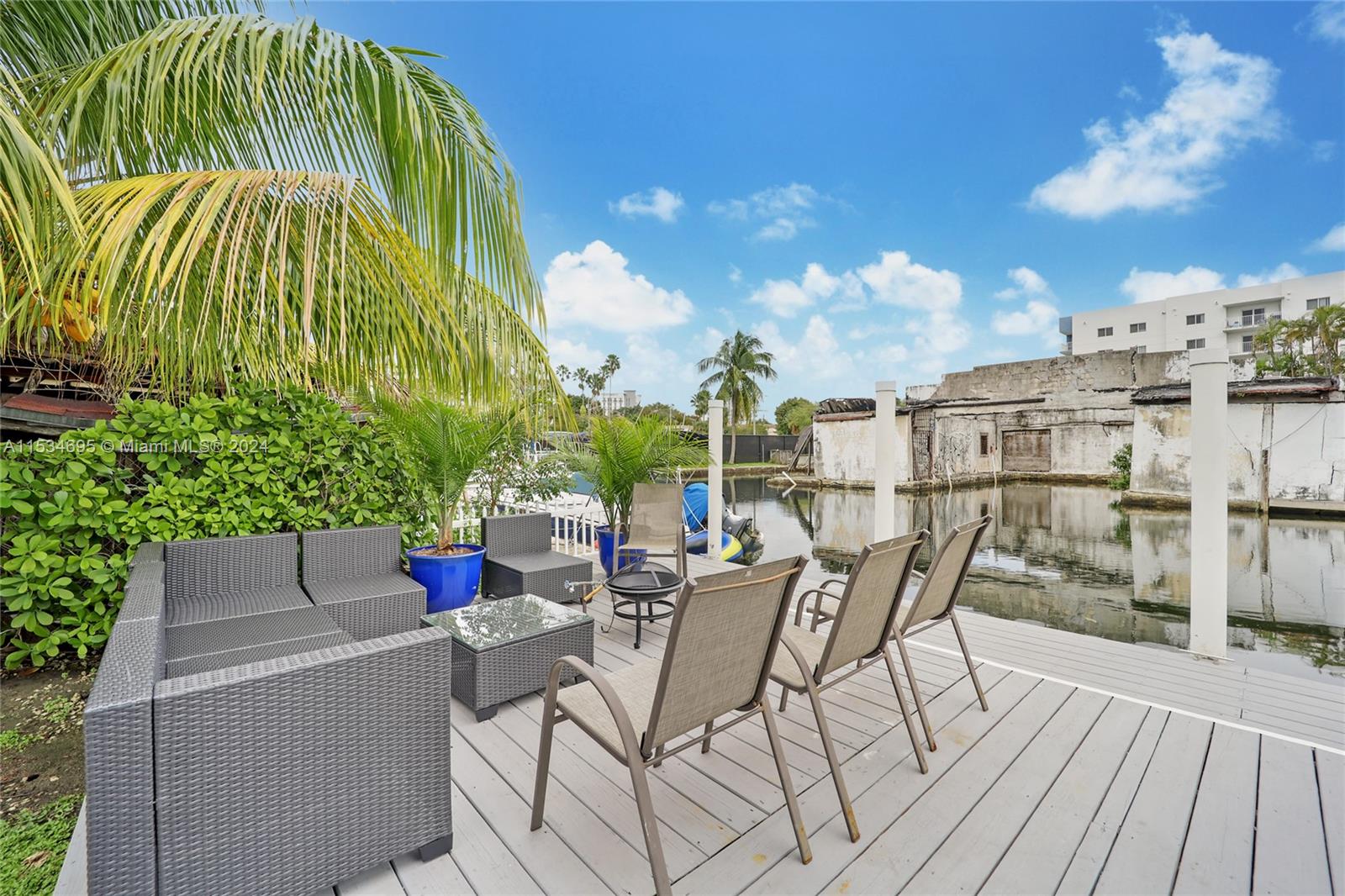 805 Northwest 7th Street Miami, FL 33136 - Photo 24 of 29 a view of a terrace with furniture and stove