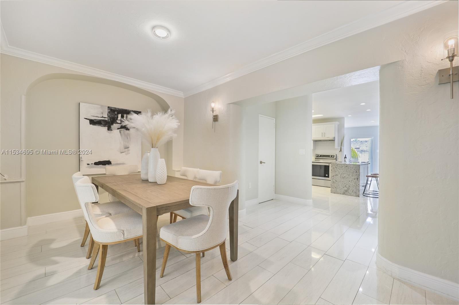 805 Northwest 7th Street Miami, FL 33136 - Photo 8 of 29 a view of a dining room with furniture