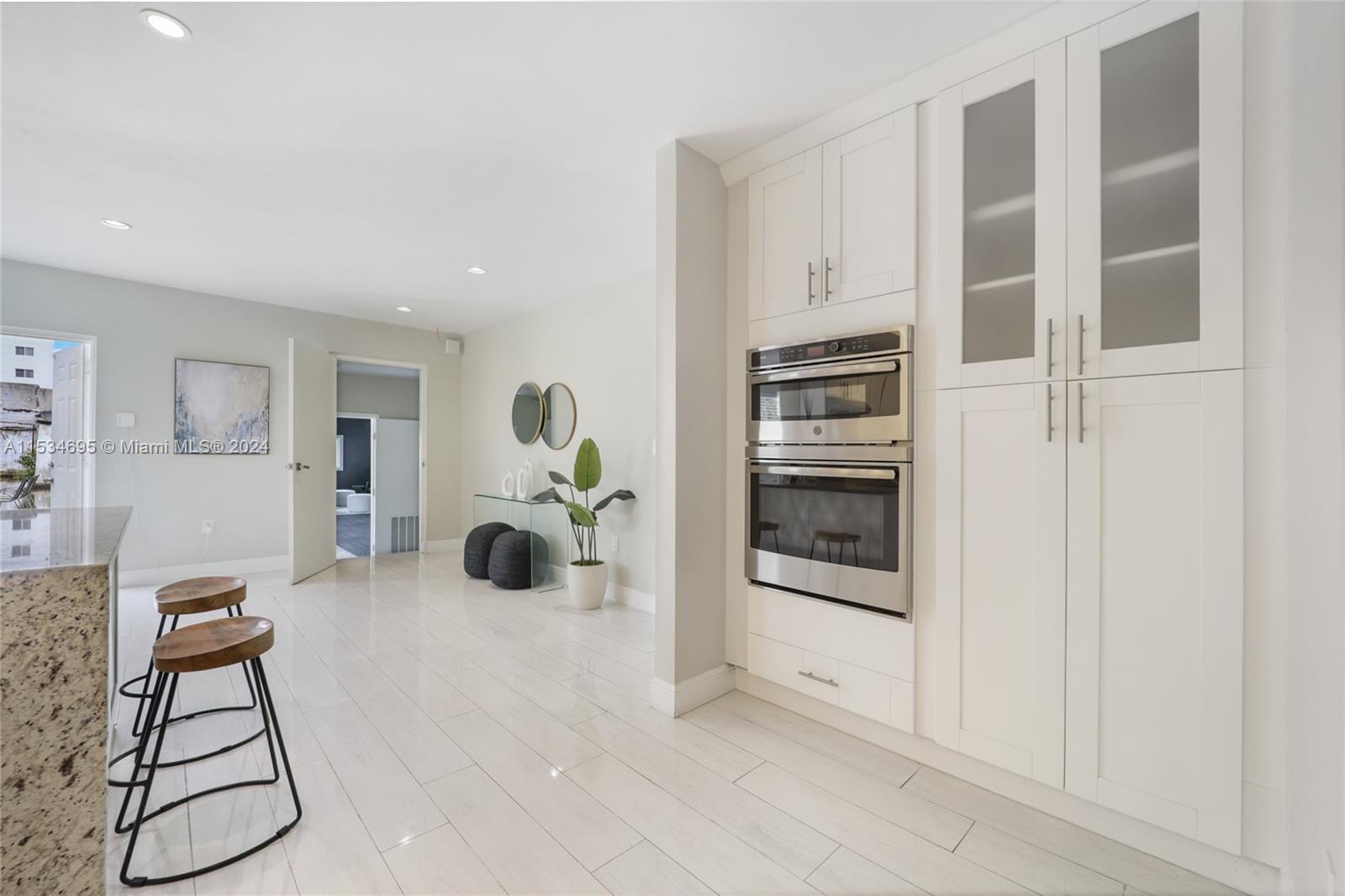 805 Northwest 7th Street Miami, FL 33136 - Photo 10 of 29 a view of a livingroom with furniture and hardwood floor