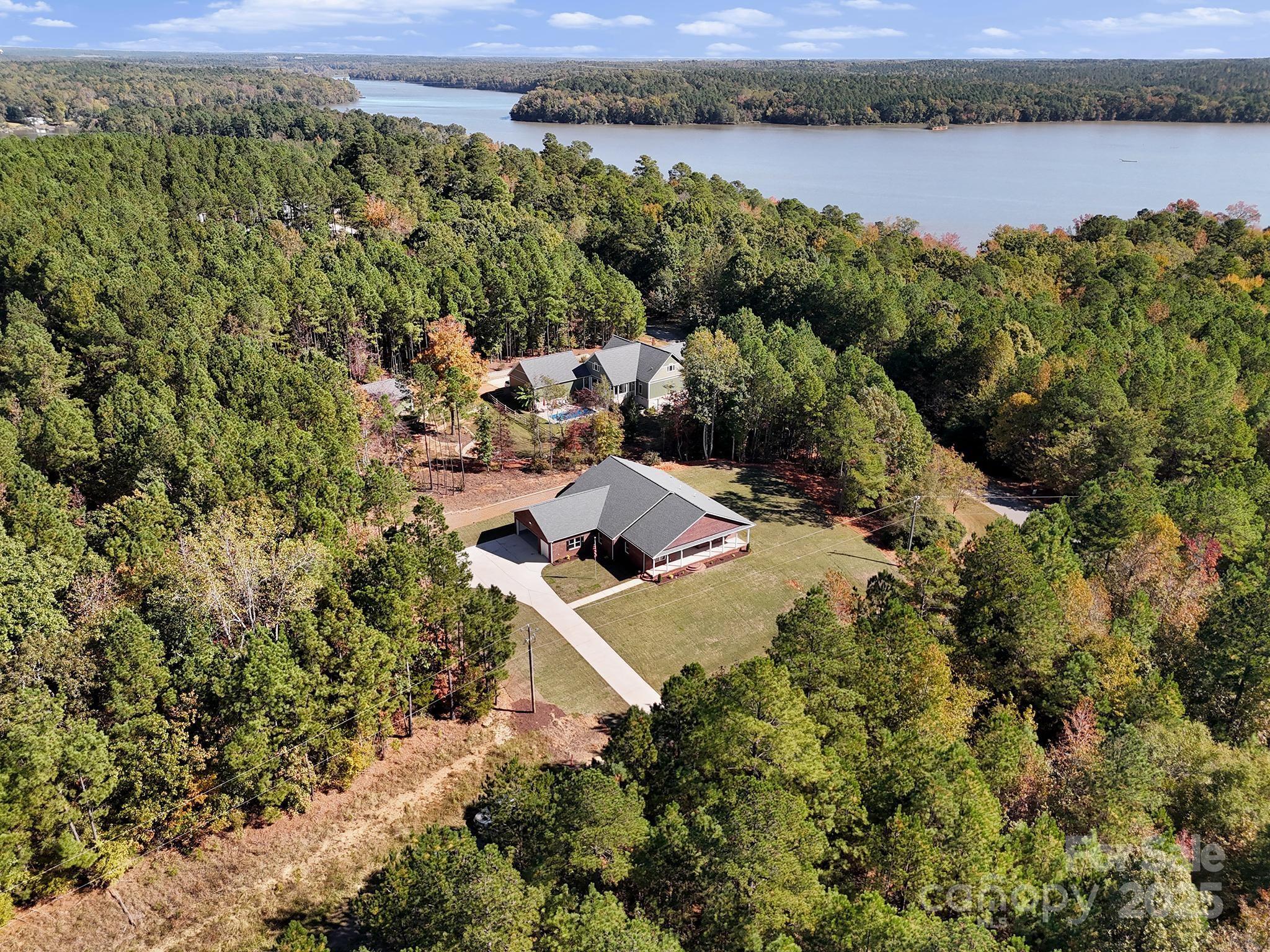 1199 Brunson Road Fort Lawn, SC 29714 - Photo 1 of 48 an aerial view of a residential houses with outdoor space and trees