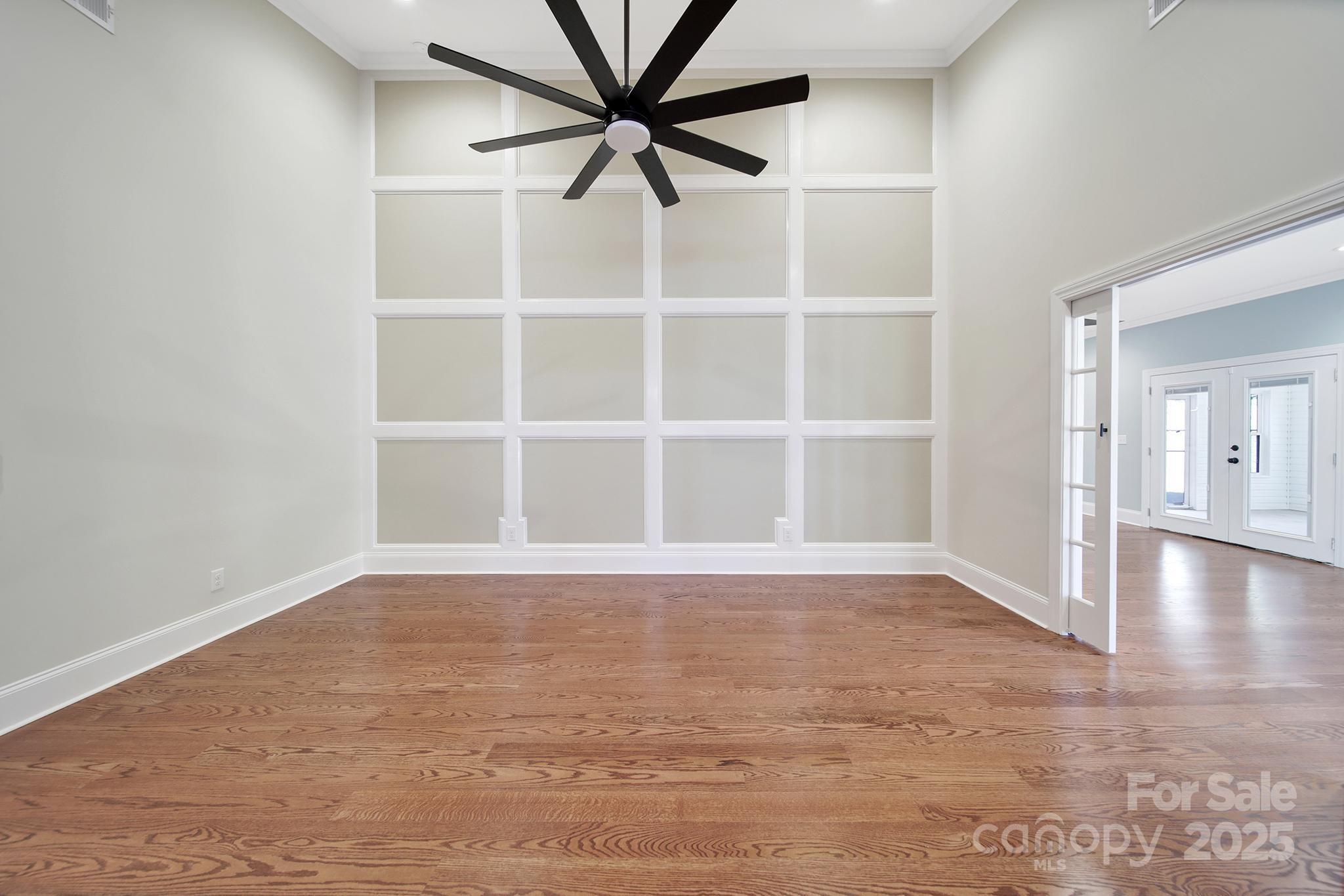 1199 Brunson Road Fort Lawn, SC 29714 - Photo 35 of 48 a view of an empty room with a window and wooden floor