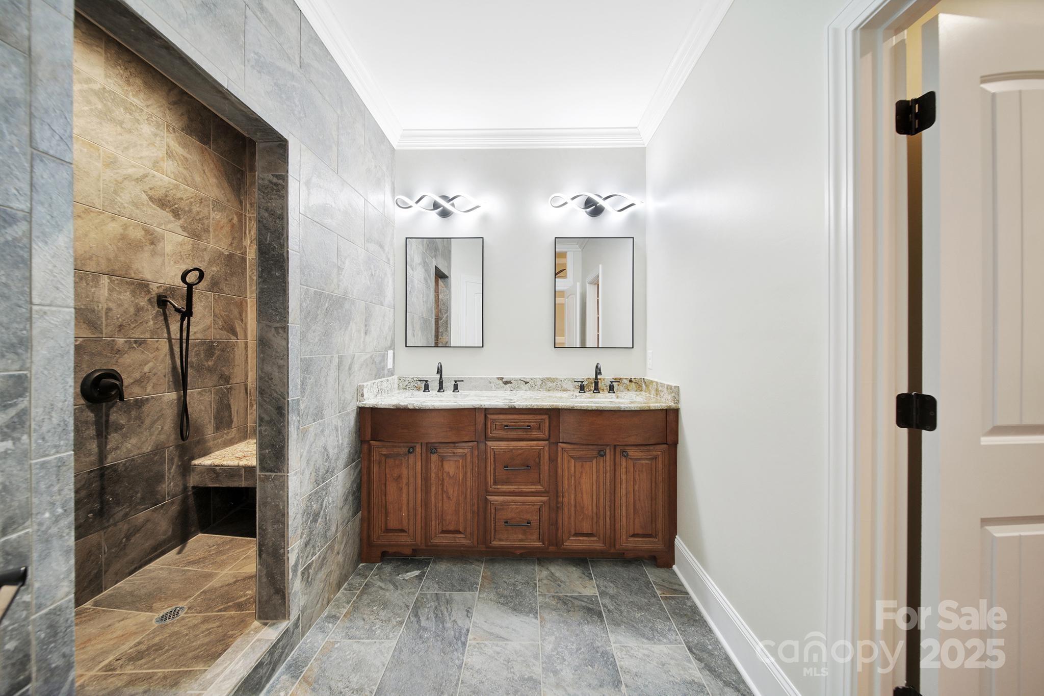 1199 Brunson Road Fort Lawn, SC 29714 - Photo 37 of 48 a bathroom with double vanity and a mirror
