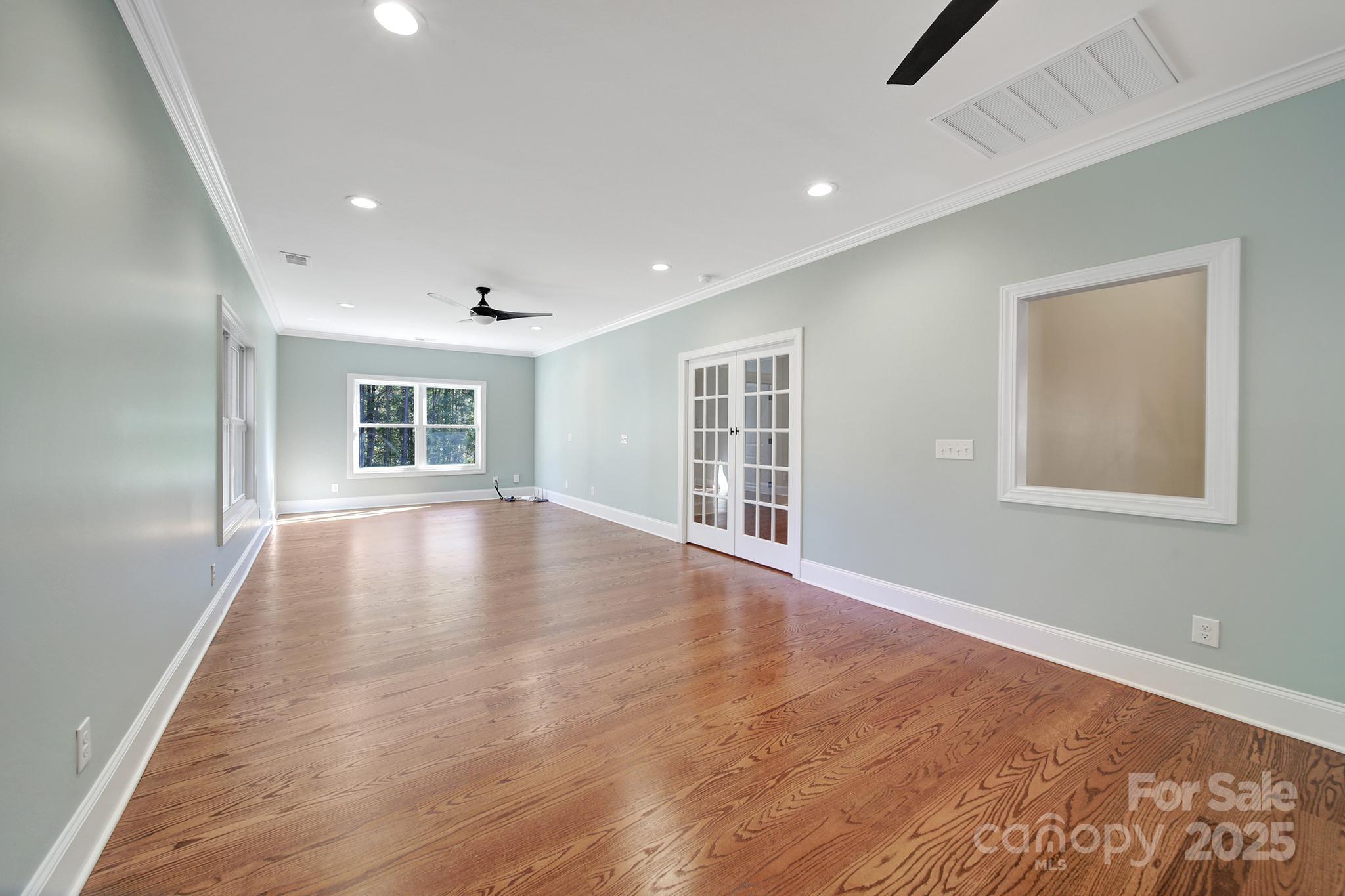 1199 Brunson Road Fort Lawn, SC 29714 - Photo 41 of 48 a view of empty room with wooden floor and fan