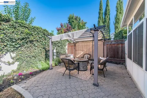 a outdoor living space with furniture and garden view