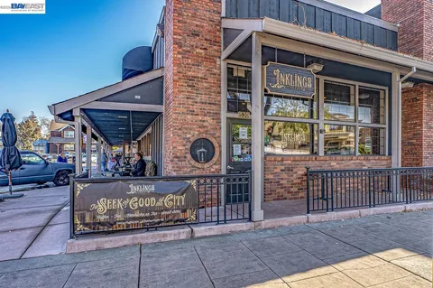 a view of a swimming pool with a yard