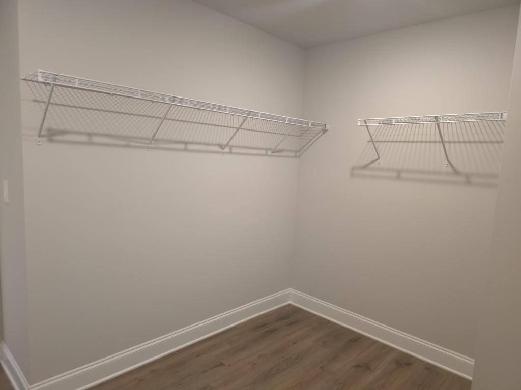 4240 Cavalier Way Duluth, GA 30097 - Photo 29 of 46 a view of a room with racks on the wall