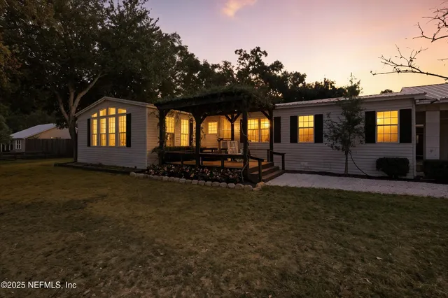 a front view of a house with patio