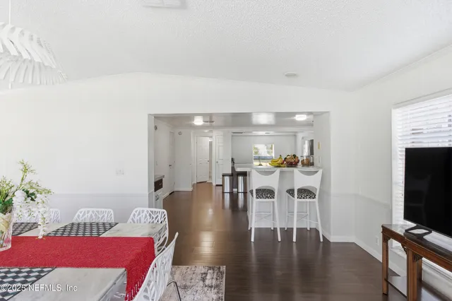 a view of a dining room with furniture