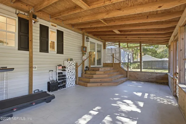 a view of a workspace with furniture