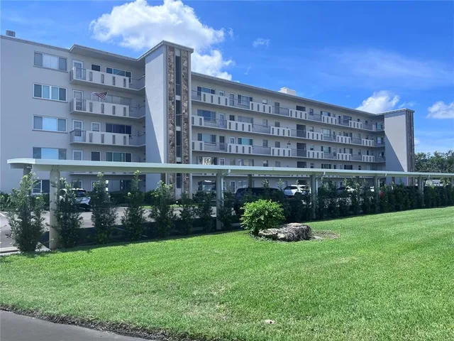 a view of a building with garden