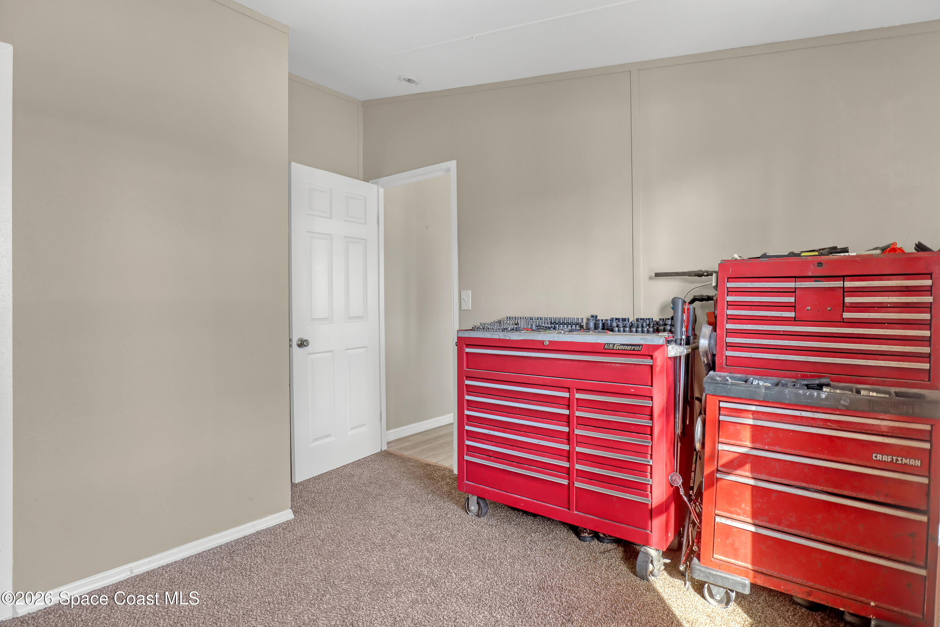 354 Akorn Street Cocoa, FL 32927 - Photo 16 of 29 a room with stairs and a dresser
