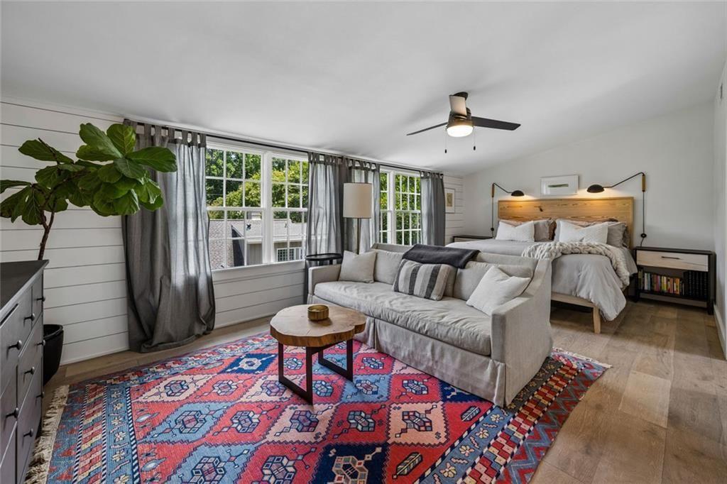 2069 Edinburgh Terrace Northeast Atlanta, GA 30307 - Photo 27 of 72 a living room with furniture and a large window