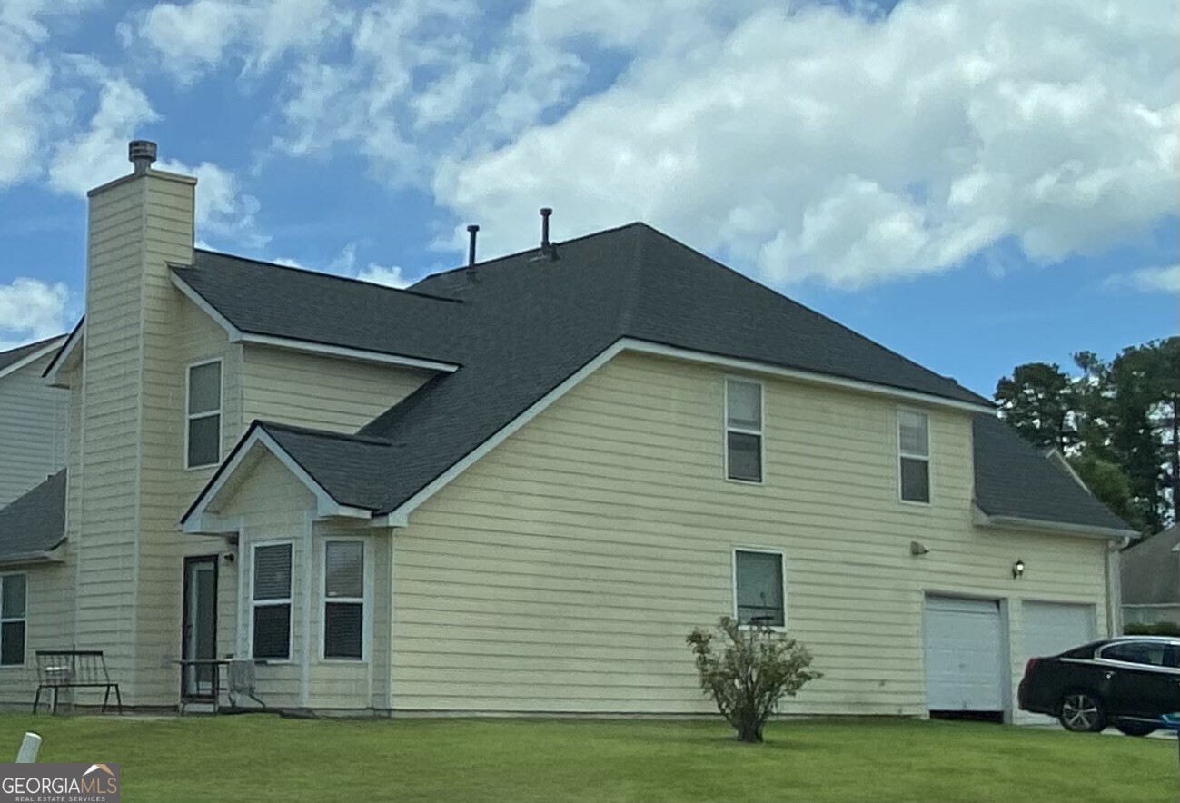 530 Shire Lane Fairburn, GA 30213 - Photo 31 of 36 a view of a house with a yard