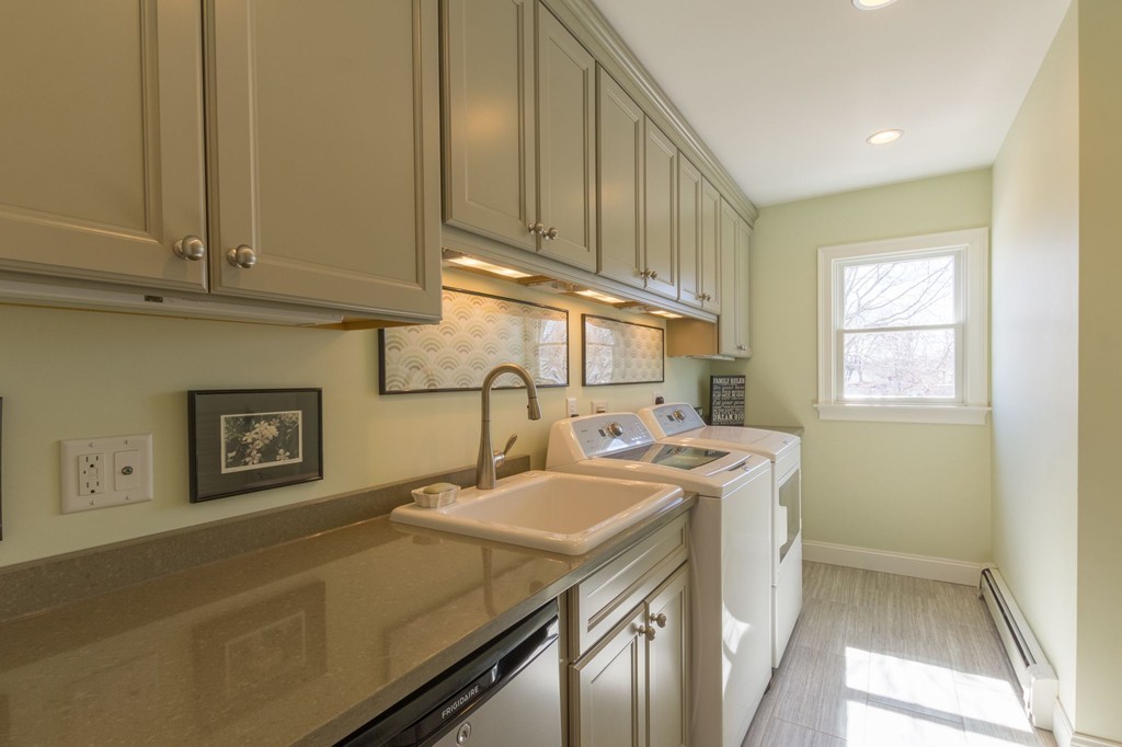 126-128 Jericho Road Scituate, MA 02066 - Photo 23 of 29 a utility room with dryer and washer