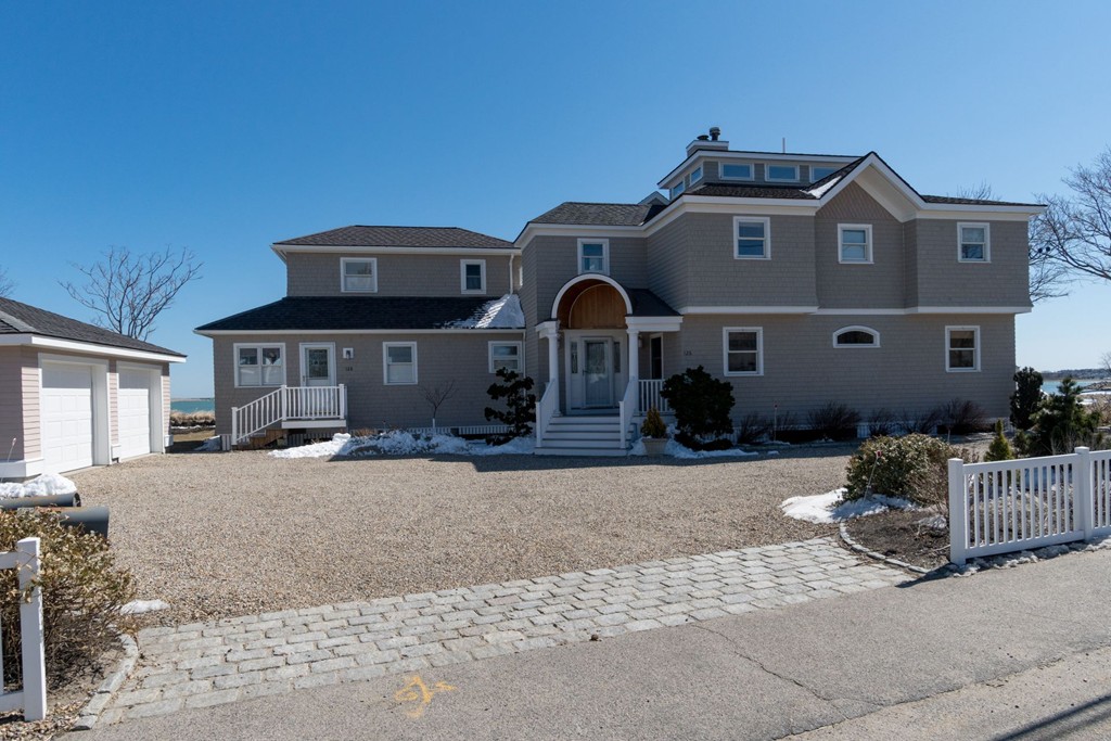 126-128 Jericho Road Scituate, MA 02066 - Photo 3 of 29 a front view of a house with a yard