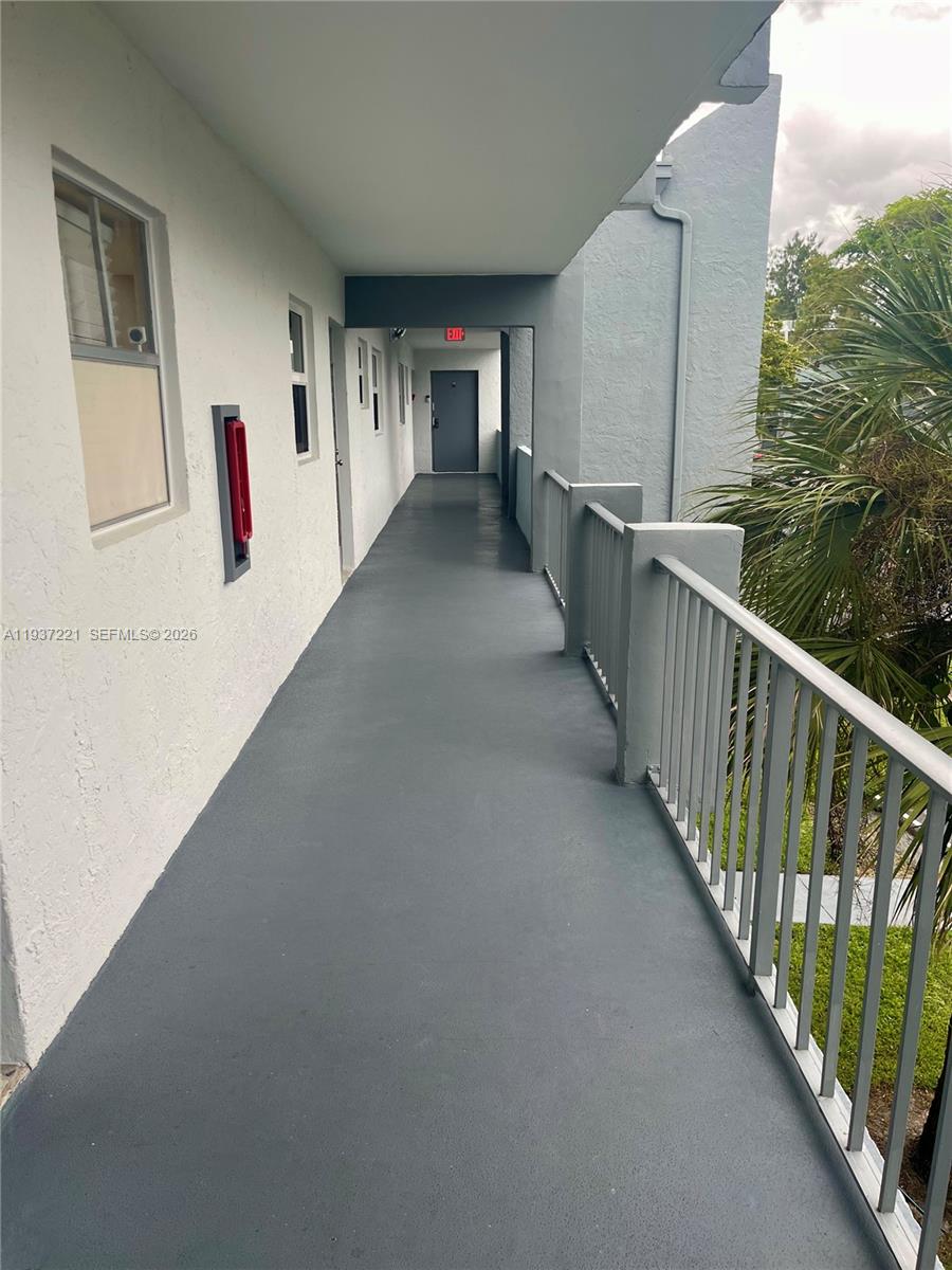 8351 Sands Point Boulevard, Unit A208 Tamarac, FL 33321 - Photo 3 of 15 a view of a balcony
