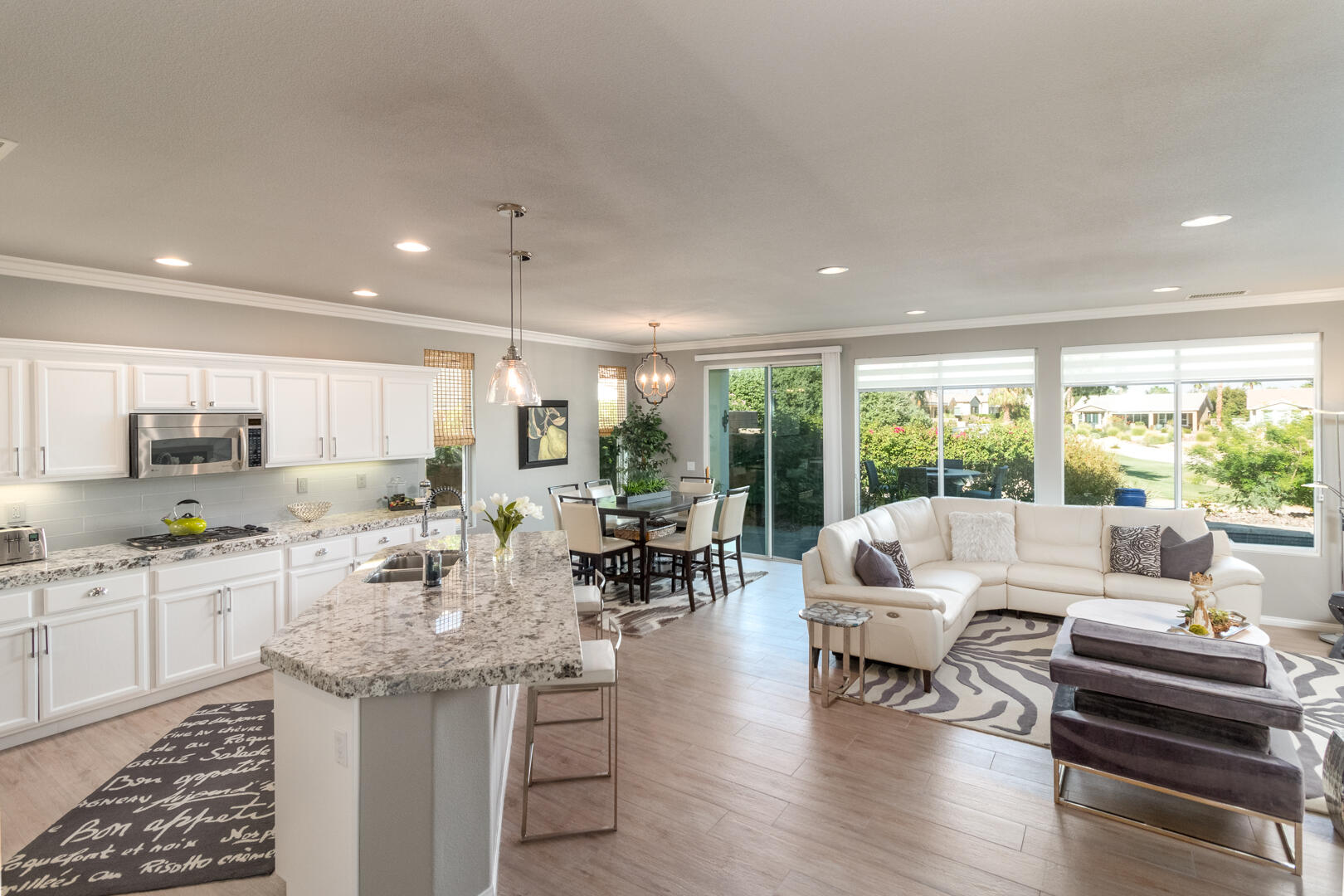 60290 Sweetshade Lane La Quinta, CA 92253 - Photo 14 of 28 a living room with furniture and a large window