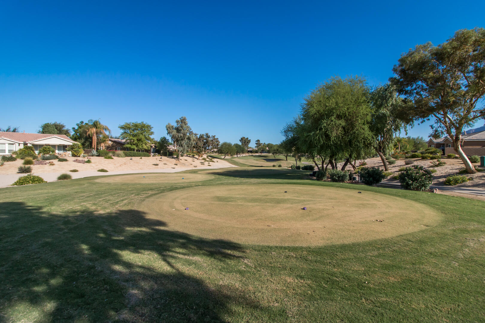 60290 Sweetshade Lane La Quinta, CA 92253 - Photo 15 of 28 a view of an outdoor space and swimming pool