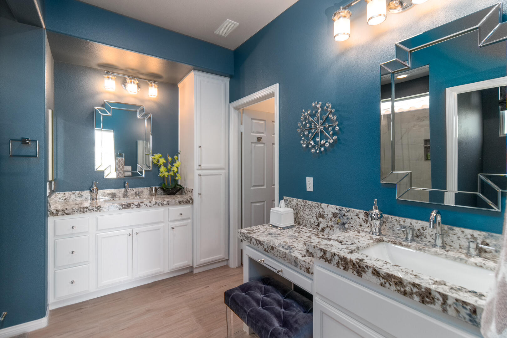 60290 Sweetshade Lane La Quinta, CA 92253 - Photo 2 of 28 a bathroom with a granite countertop sink and a mirror