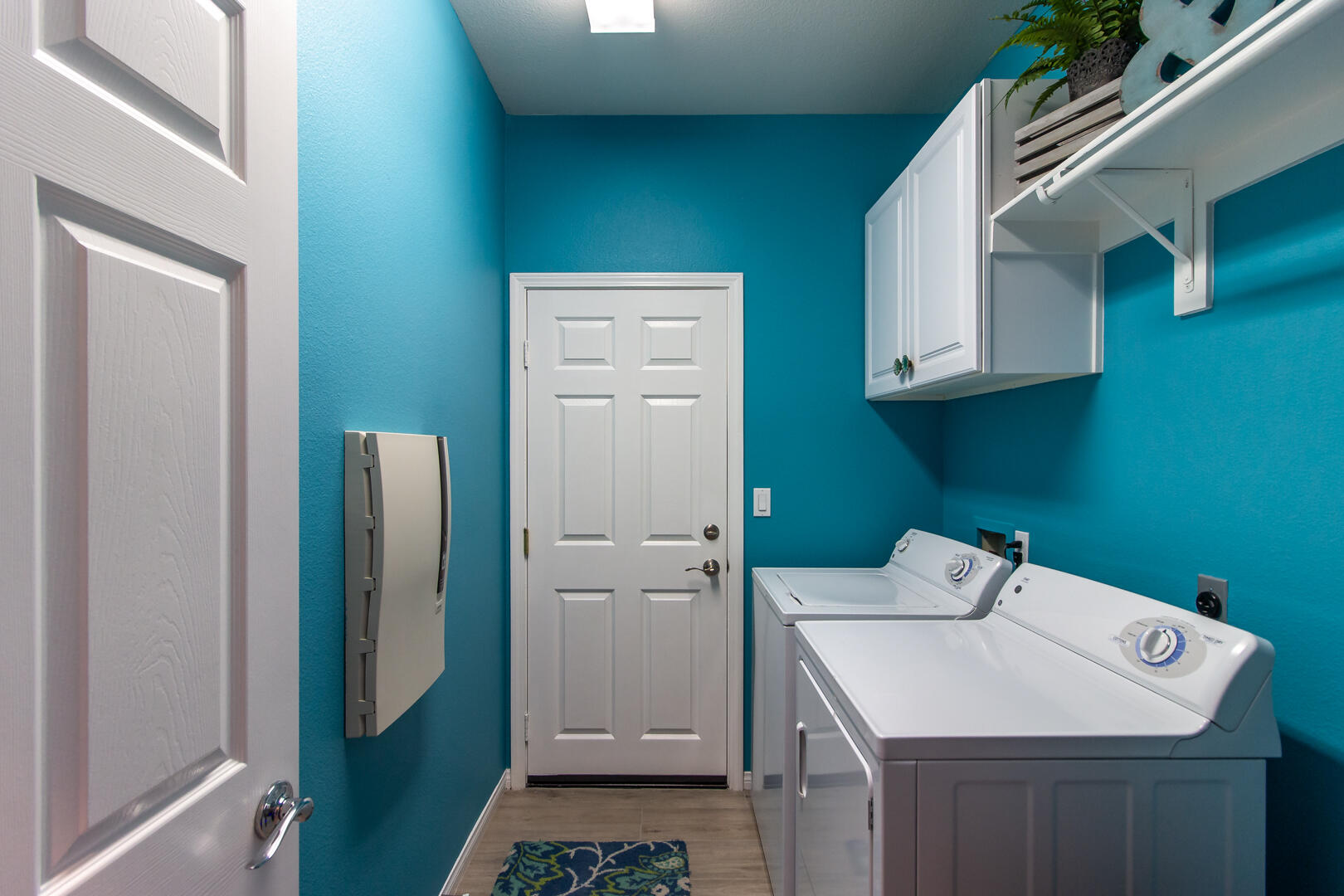 60290 Sweetshade Lane La Quinta, CA 92253 - Photo 28 of 28 a utility room with a sink washer and dryer