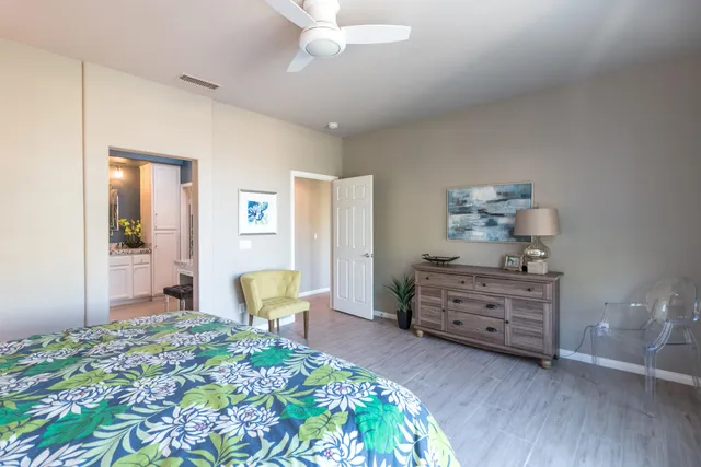 a bedroom with a bed and furniture