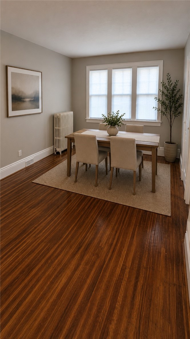 28 Vick Park B Rochester, NY 14607 - Photo 12 of 25 Large living area staged (AI) as Dining room on on
