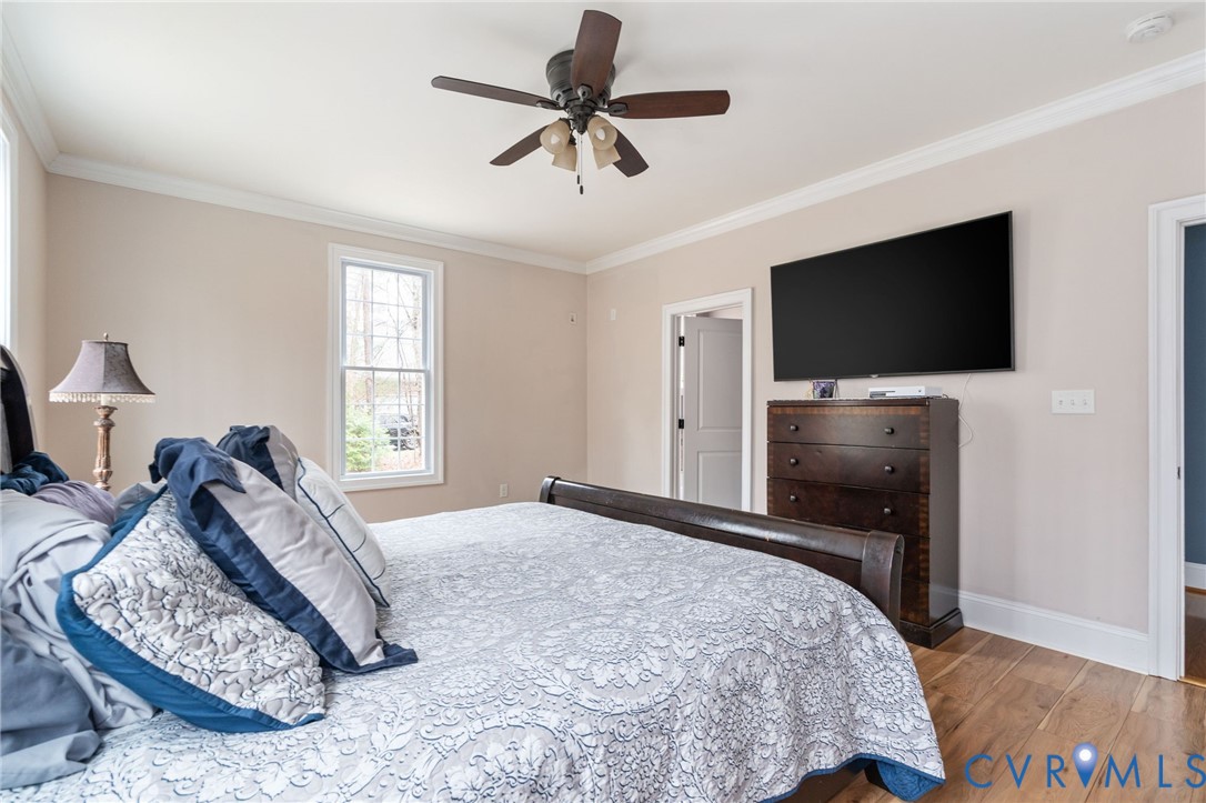 8825 First Branch Lane Chesterfield, VA 23838 - Photo 21 of 63 The main-level primary suite provides a peaceful r