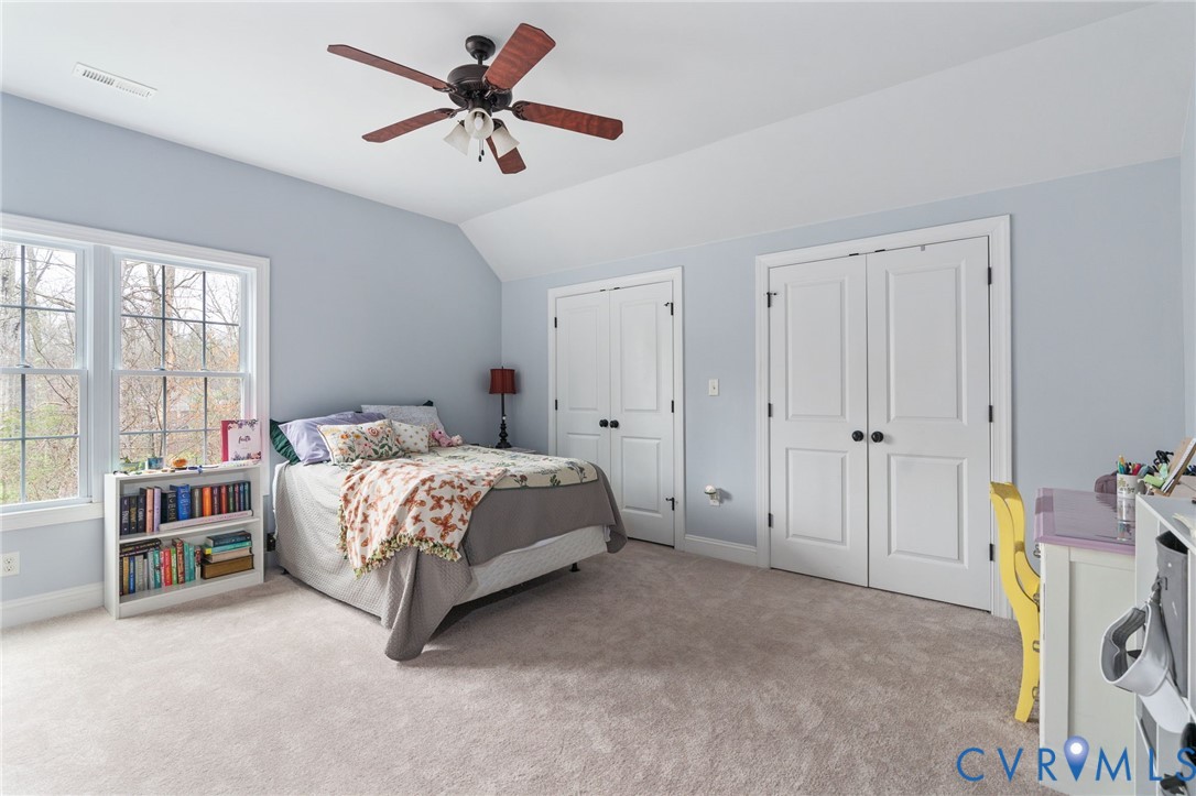 8825 First Branch Lane Chesterfield, VA 23838 - Photo 32 of 63 a bedroom with a bed and a cabinet