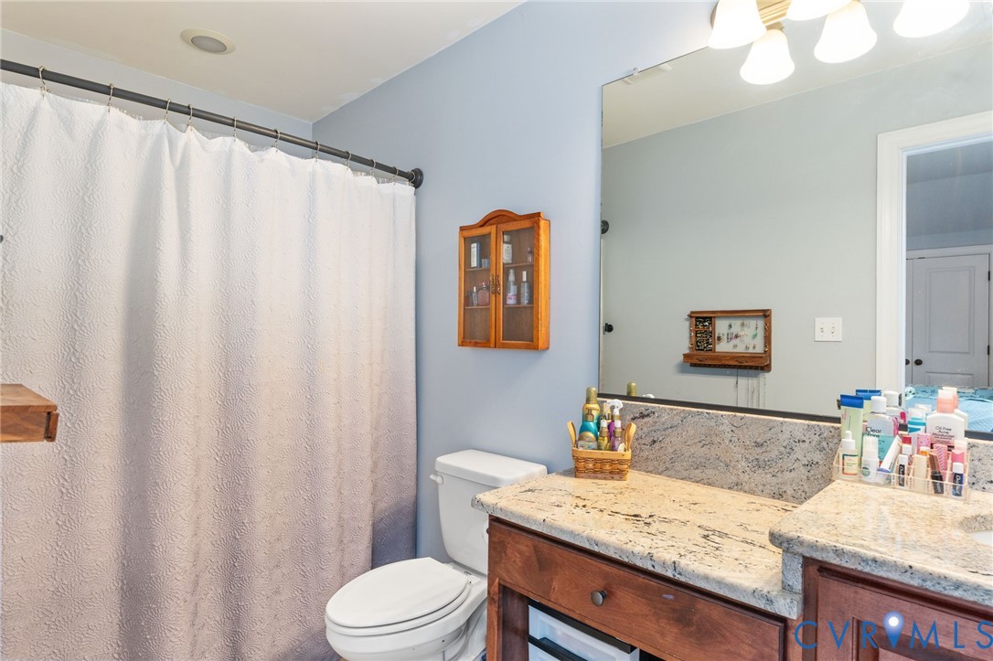 8825 First Branch Lane Chesterfield, VA 23838 - Photo 34 of 63 Bedroom 2 with ensuite bathroom. Double door walk