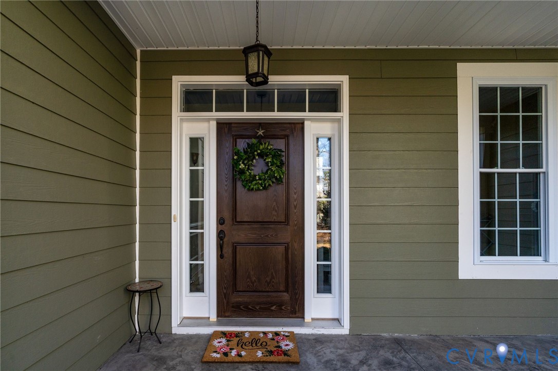 8825 First Branch Lane Chesterfield, VA 23838 - Photo 4 of 63 a front view of a house with a shower