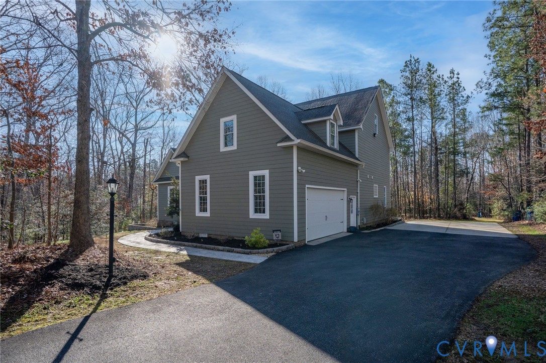 8825 First Branch Lane Chesterfield, VA 23838 - Photo 51 of 63 Welcome to this beautifully maintained, custom-bui