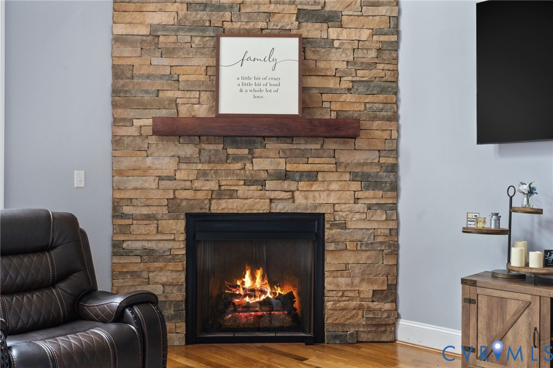 8825 First Branch Lane Chesterfield, VA 23838 - Photo 8 of 63 a living room with furniture and a fireplace