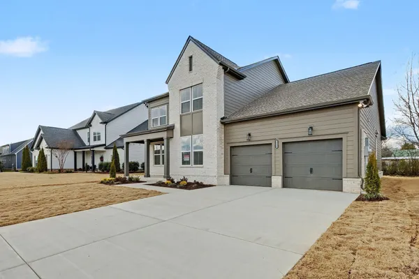 a view of empty room with windows